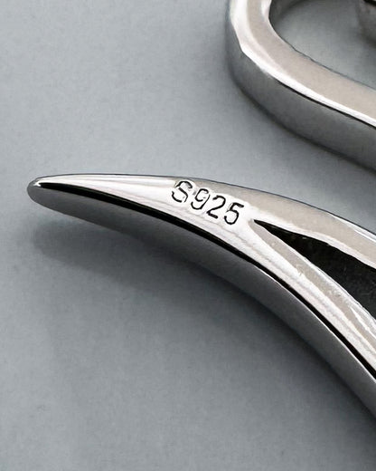 The Shape of Devotion stud earrings